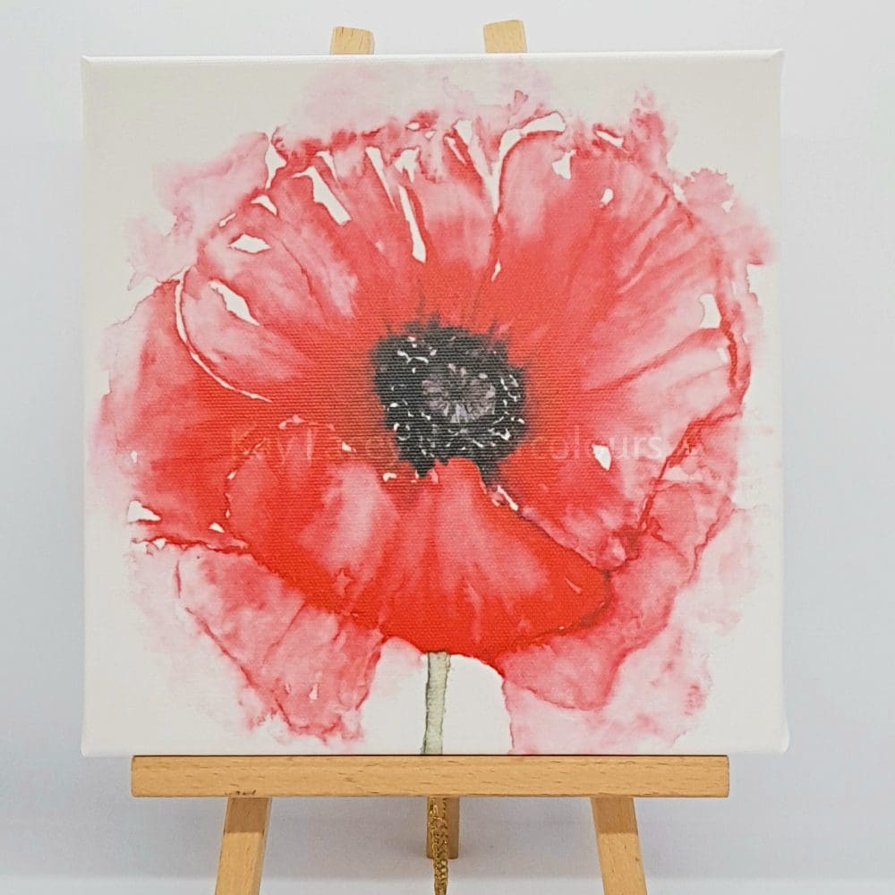 Poppy art canvas displayed on small easel