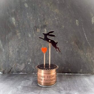 recycled metal sculpture called hare today gone tomorrow