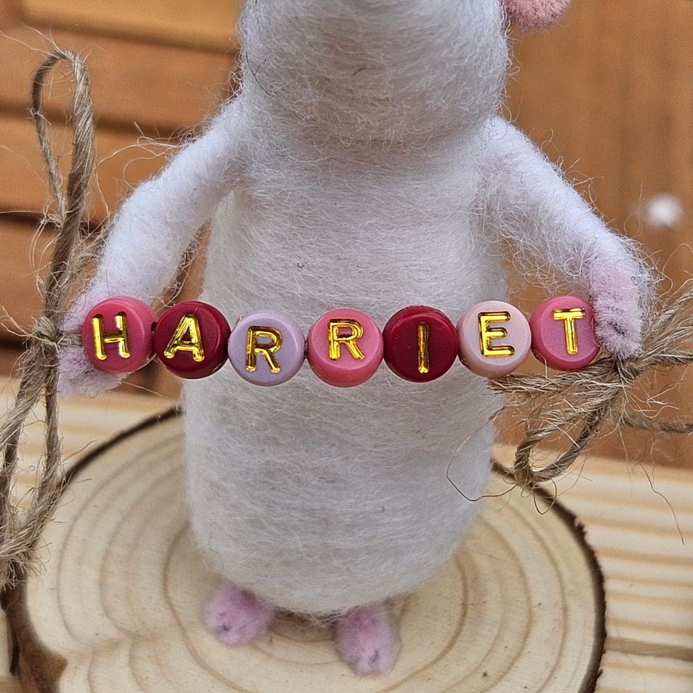 Mouse with pink bead name