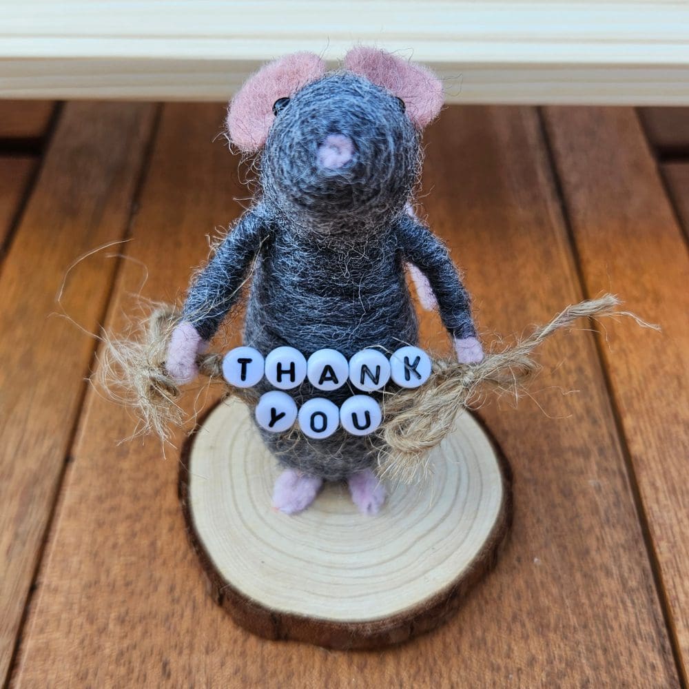 Grey needle felted mice holding Thank you bead sign
