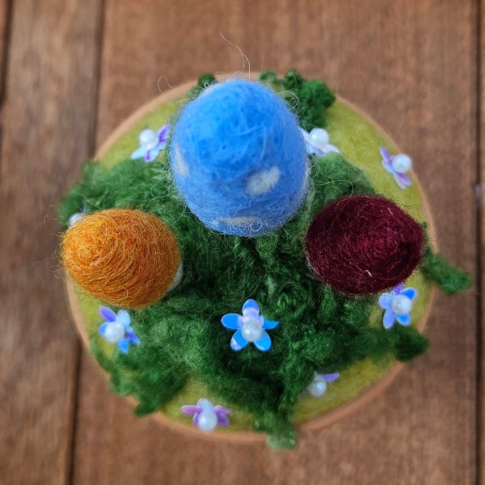 top of toadstool needle felted pincushion blue