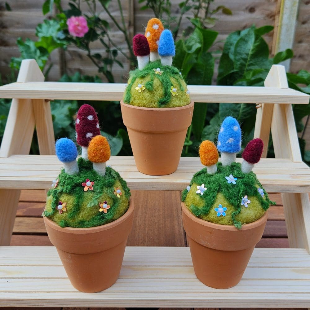 Needle felted toadstool pin cushions in terracotta plant pots