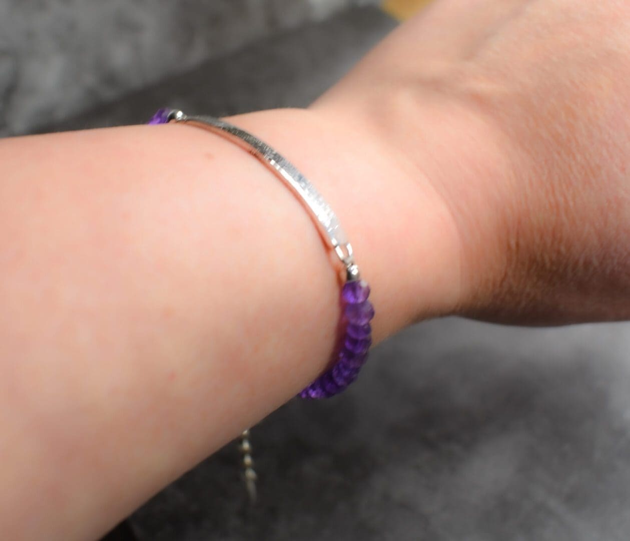 Gemstone bar bracelet, made in Argentium Silver with Amethyst gemstones.