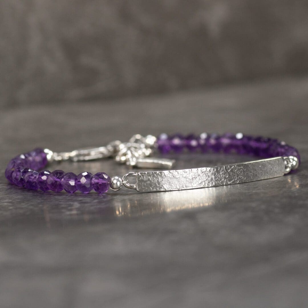 This Argentium Silver Bar Bracelet has two rows of ethically sourced Amethyst Gemstones and is handmade in the UK.