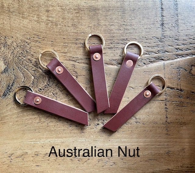 Key fobs in Bakers English leather with brass flat split ring and copper rivet.