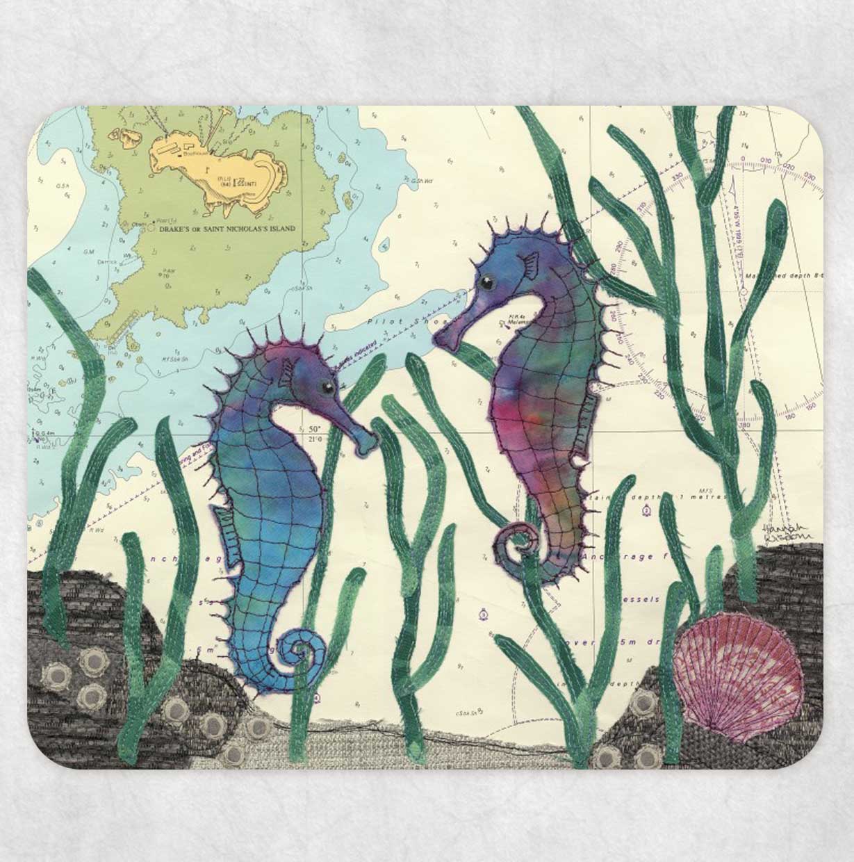 Placemat printed with a textile art design of seahorses on an old sea chart