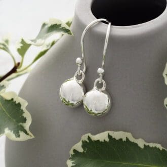 Shiny round pebble dangle earrings made from Argentium silver on simple hook earwires