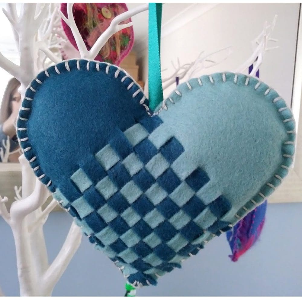 The finished lavender woven heart product in the aqua/teal colourway