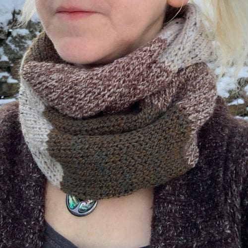 Knitted infinity scarf in textured yarn in brown shades, block stripes