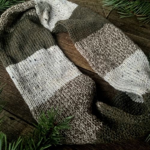 Knitted infinity scarf in block stripes, textured yarn in shades of browns
