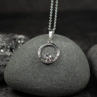 Delicate White Topaz and Argentium Silver Circle Necklace with a White Topaz gemstone. Sterling Silver.