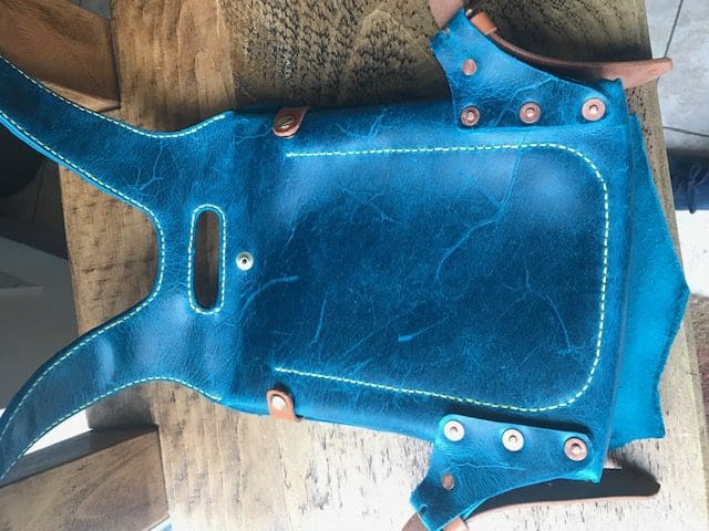 Blue English leather backpack pocket detail