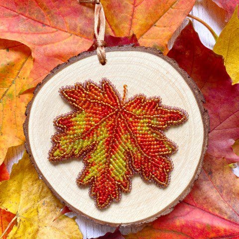 Hand beaded autumn leaf hanging by DewCatDesigns