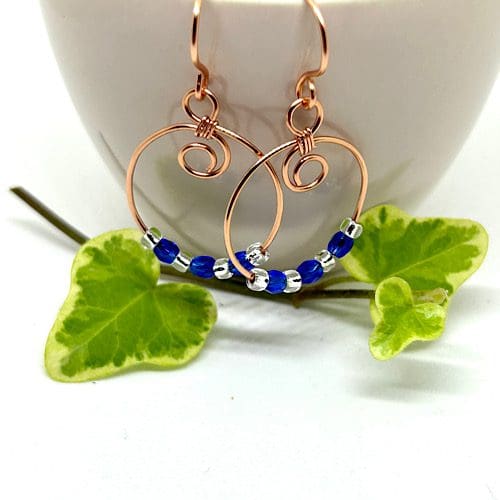 Copper hoop earrings with blue crystal beads 2