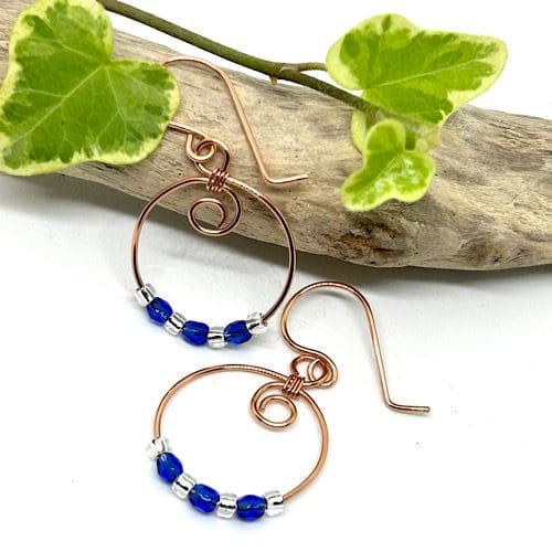 Copper hoop earrings with blue crystal beads 5