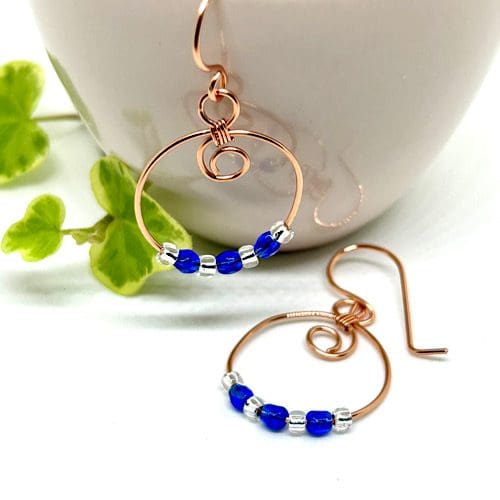 Copper hoop earrings with blue crystal beads 6