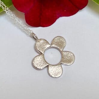 Handmade large silver flower necklace with circle cut out middle, 16 or 18 inch chain