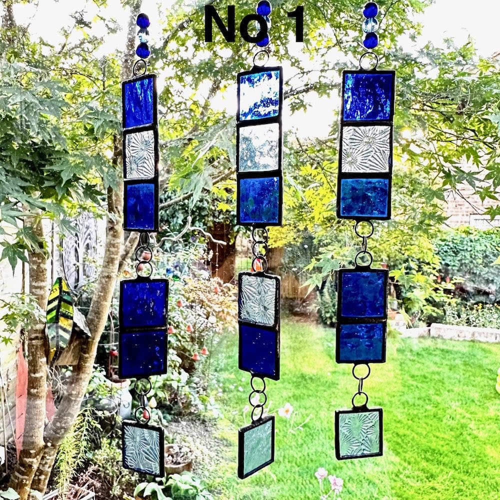 Stained glass window strip hanger