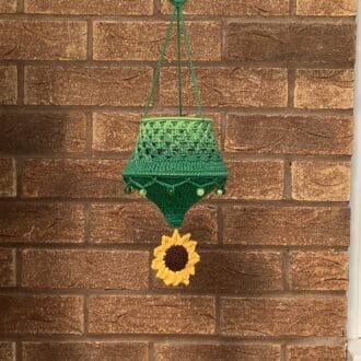 Crochet lantern with a sunflower