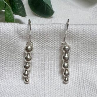 Molten silver bubble drop earrings made by hand