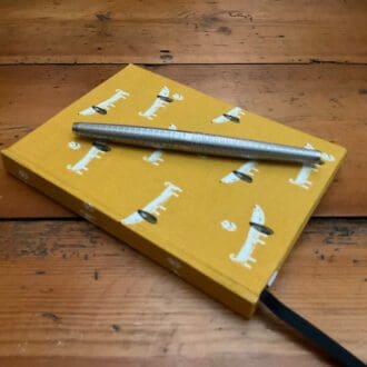 A6 fabric covered handmade notebook filled with ivory lined paper