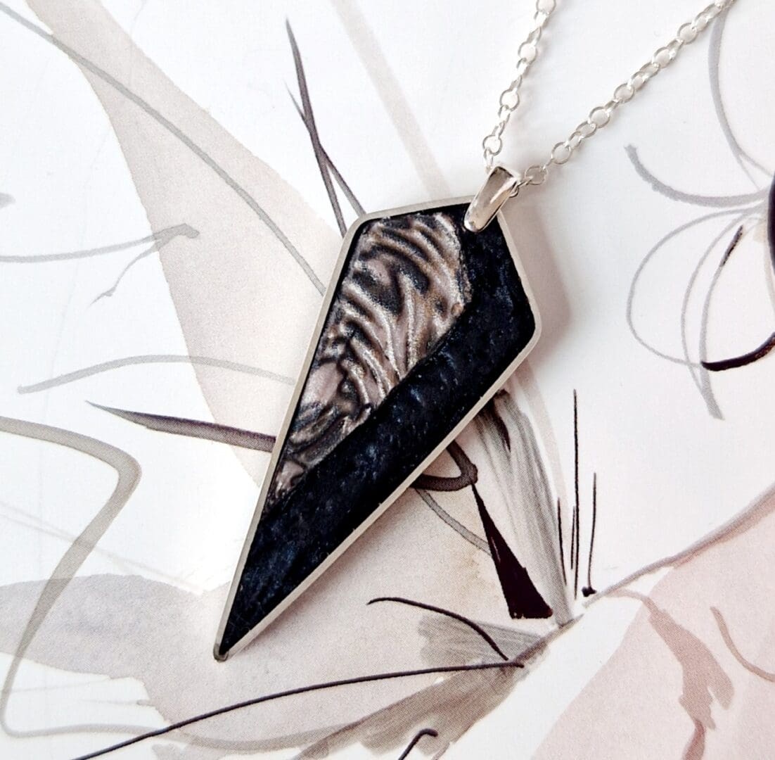 Sterling Silver Kite Shaped Pendant Inlayed with Charcoal Resin and Neutral Tones Mokume Gane Effect Polymer Clay by VJD Design
