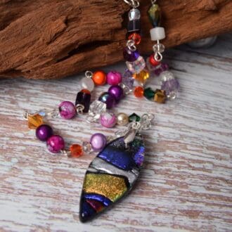 fused glass dichroic pendant on a beaded chain. ideal Christmas gift