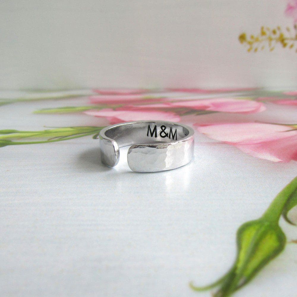 6mm width hammered textured aluminium cuff ring with a hidden message hand stamped inside