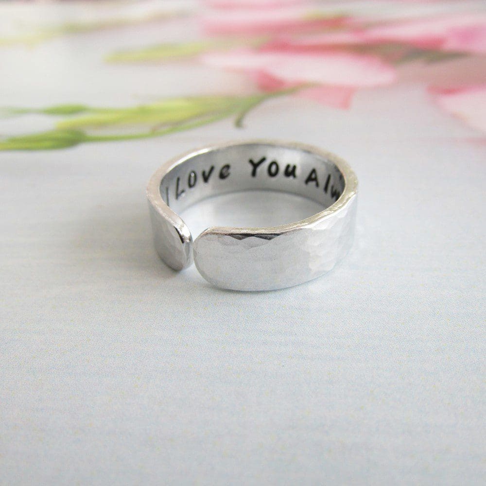 6mm width hammered textured aluminium cuff ring with a hidden message hand stamped inside