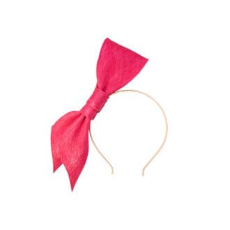 fascinator with large pink bow mounted on thin headband