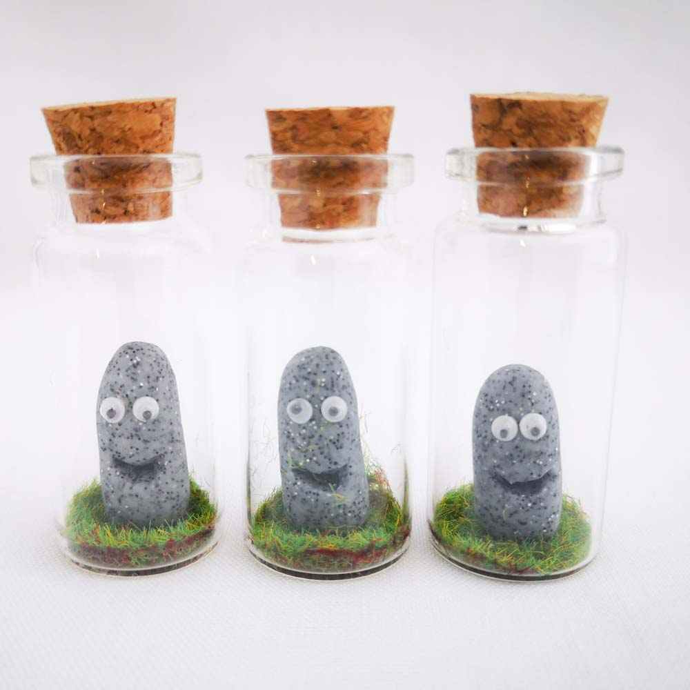 Miniature bottles with polymer clay figures inside