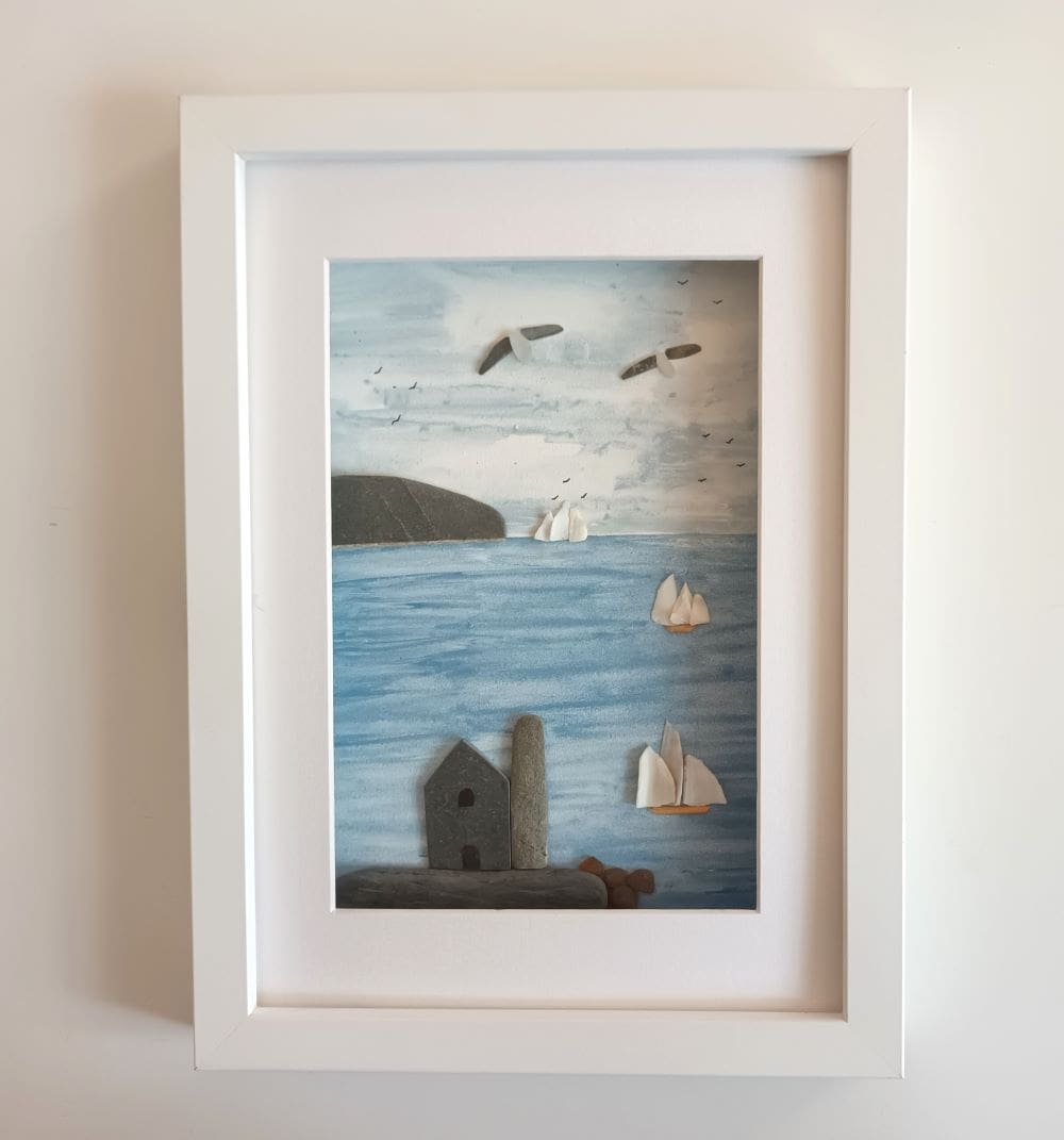 framed picture of cornish tin mine and tall ships made from beachcombed finds