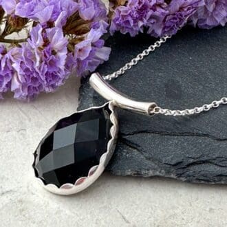 Black agate gemstone necklace set in a handmade silver setting to make a unique necklace