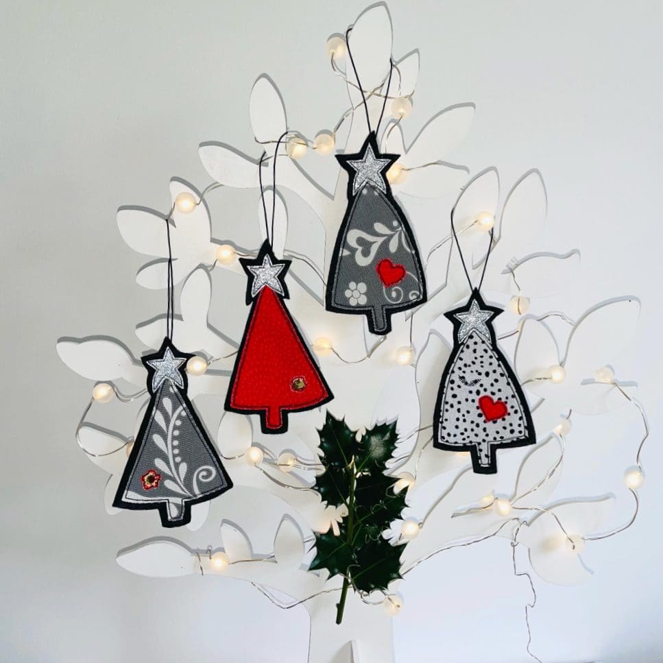 Set of fabric christmas tree decorations with glitter star and appliqué detail