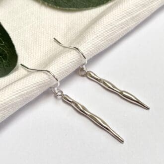 A pair of handmade silver icicle dangly earrings