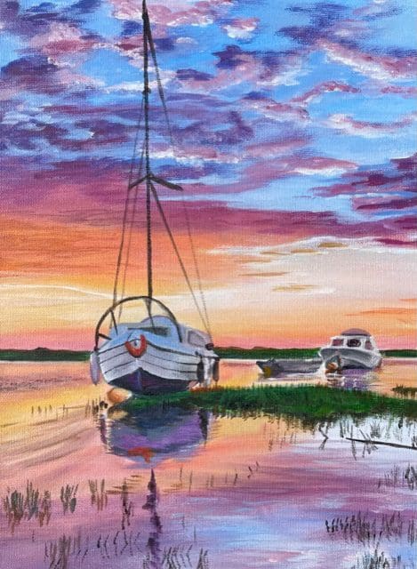 A painting of sailboats in the water at sunset using acrylic.