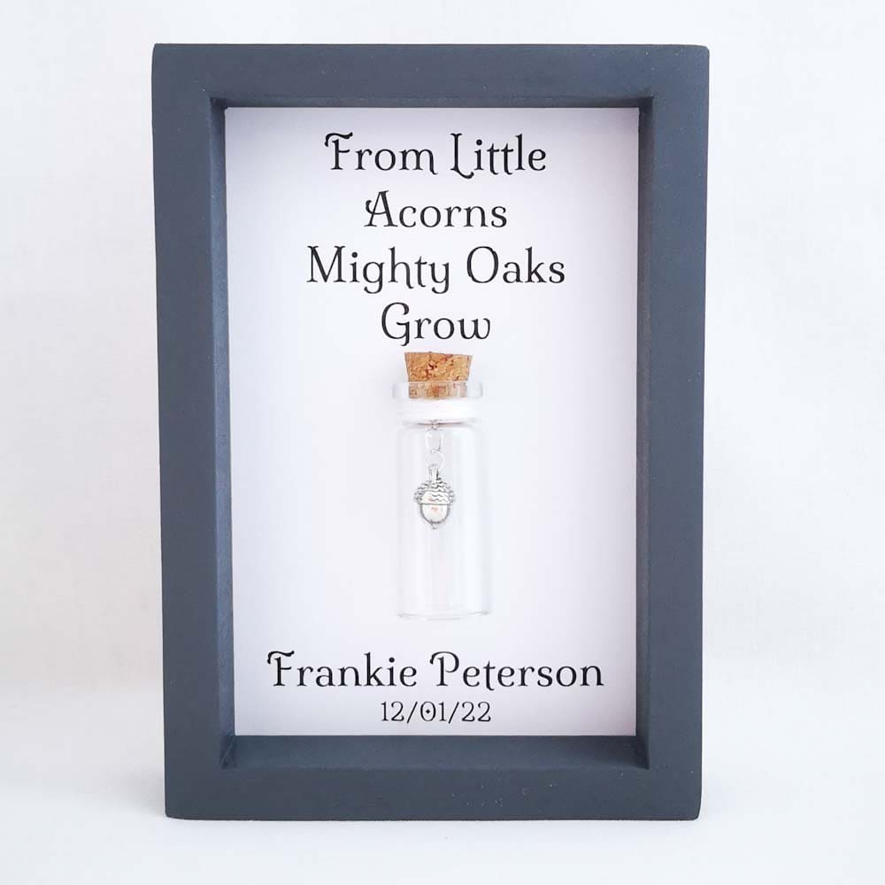 Grey frame with a miniature glass bottle, personalised new baby gift
