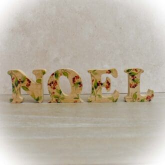 Freestanding Wooden Letters spelling NOEL, with a Winter Foliage Pattern, Christmas Decoration