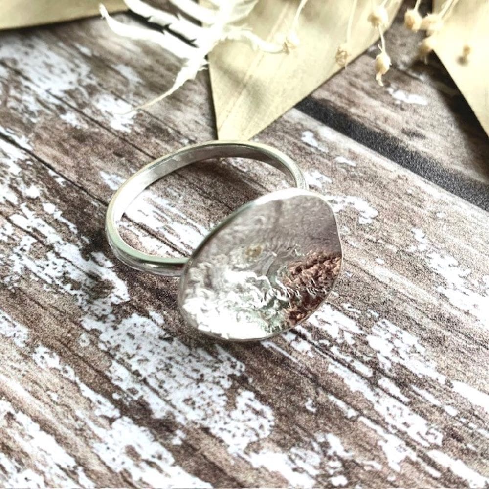 Sterling silver textured floral ring