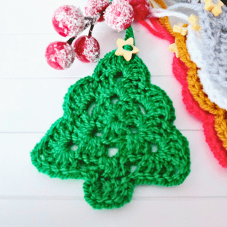 Tradition crochet Christmas trees which can be used as a hanging decoration or add a bit of sparkle to your gift wrapping. Available in vintage Christmas colours red, green, gold, silver and whitein
