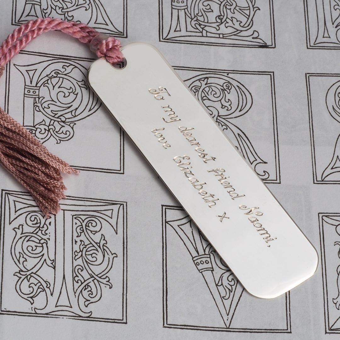 hand engraved message on sterling silver bookmark