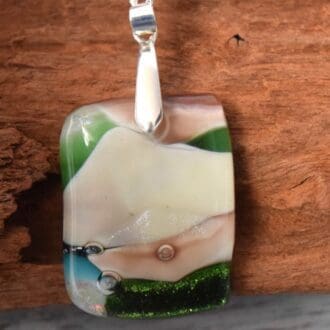 Handmade Glass Pendant and silver plated necklace with beautiful subtle colours.