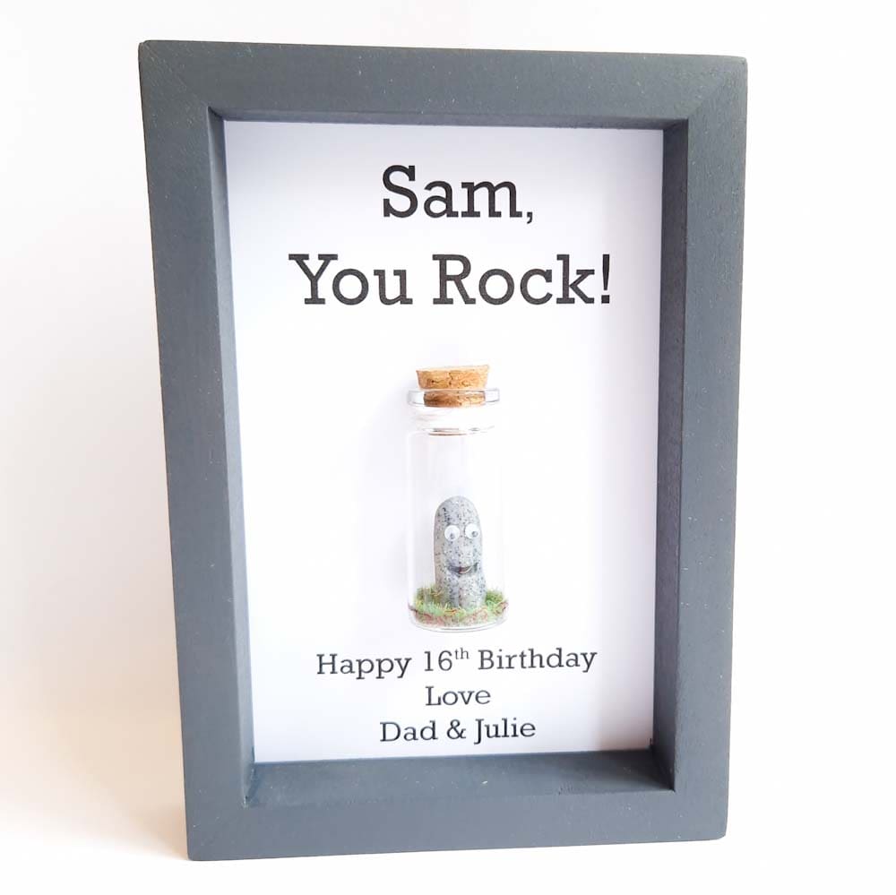 Grey frame with a rock inside a bottle gift for teenage boy