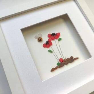 framed picture of poppies made from sea glass