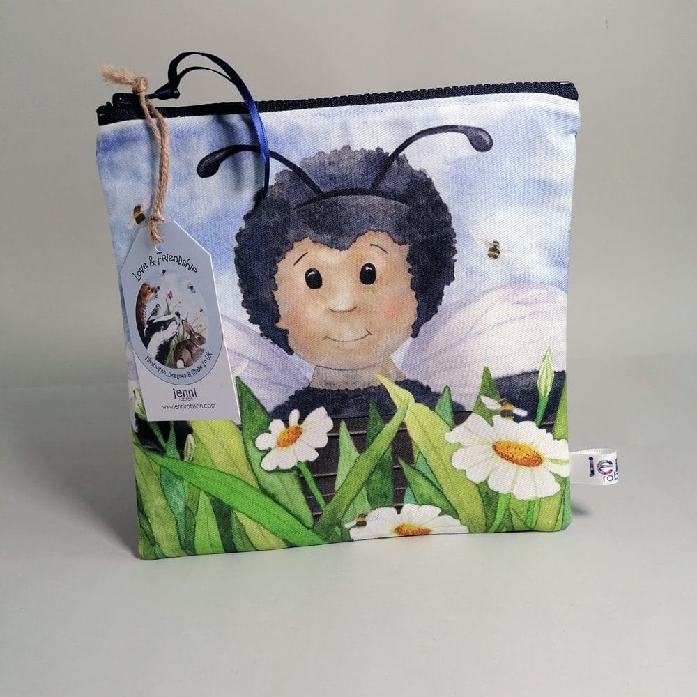 Toiletries bag decorated with a little character dressed as a bee. Cotton washbag with water resistant lining, internal pocket and chunky zipper fastening. Great as a toiletries bag, pencil case, cosmetics bag, travel bag.