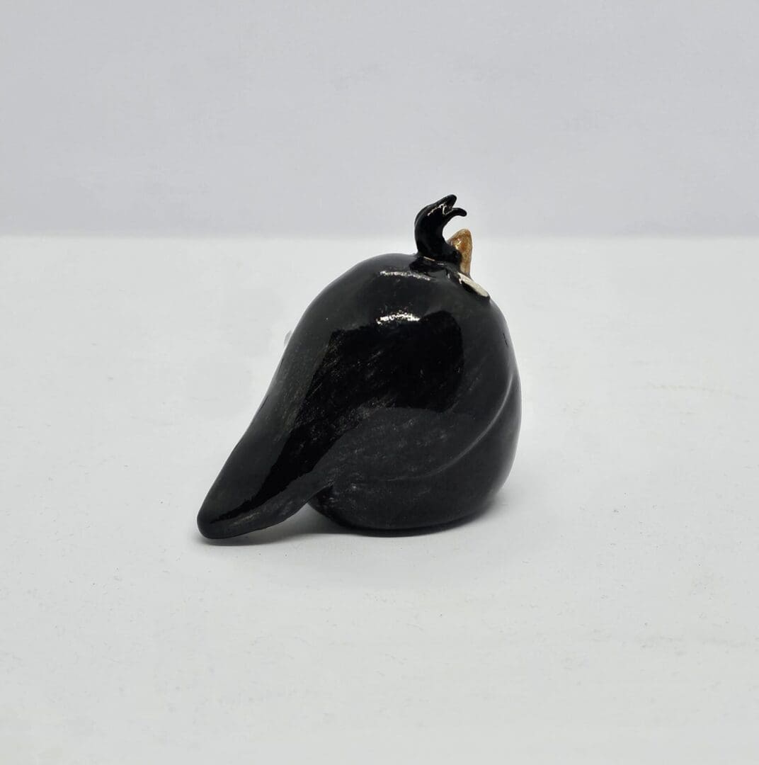 Back/side view of ceramic auklet - you can just see the orange beak