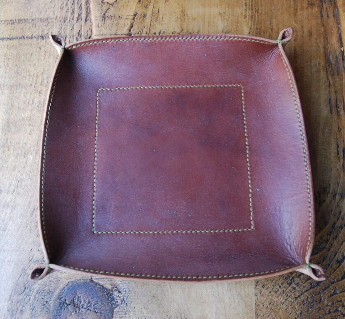 Large leather valet tray with olive stitching