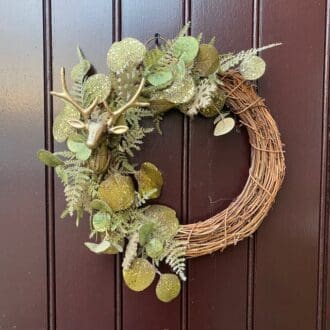 Gold-and-green-wreath-with-stag