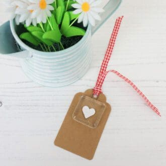 Kraft gift tag with handmade fused glass and paper cut heart keepsake
