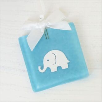 Handmade fused blue glass baby boy keepsake with paper cut elephant